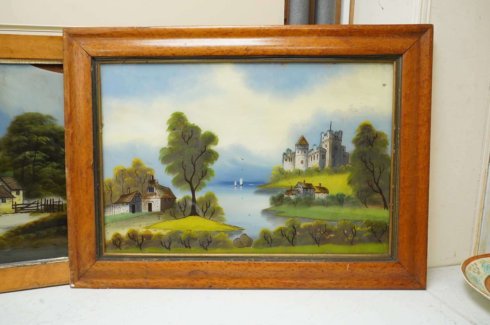 Victorian School, four reverse glass painted panels, Riverscapes, largest 39 x 60cm